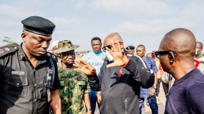 Ondo State Governor, Rotimi Akeredolu visiting the scene of an explosion that rocked Akure