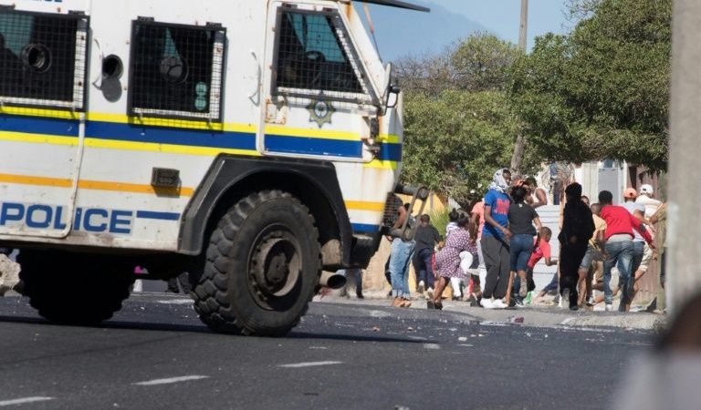 Residents of Cape Town protest over lack of access to food aid during coronavirus lockdown.