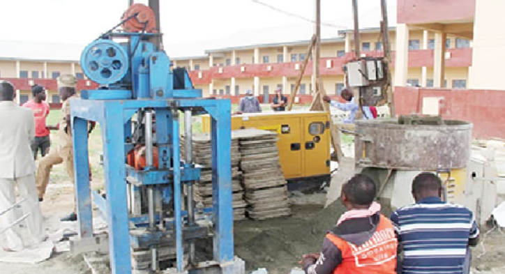 Illegal block moulding industry inside school premises